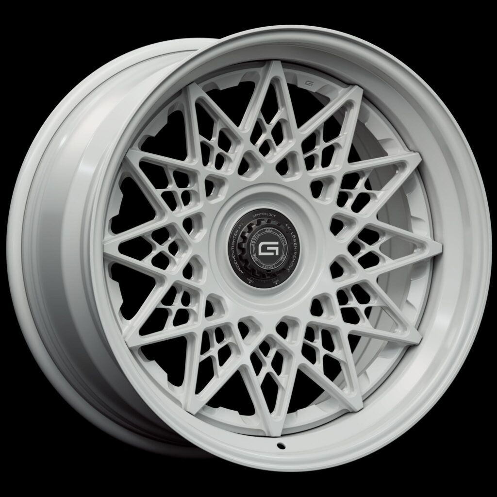 Three-quarter view of a white G21 3-piece centerlock wheel from Govad Forged Heritage series