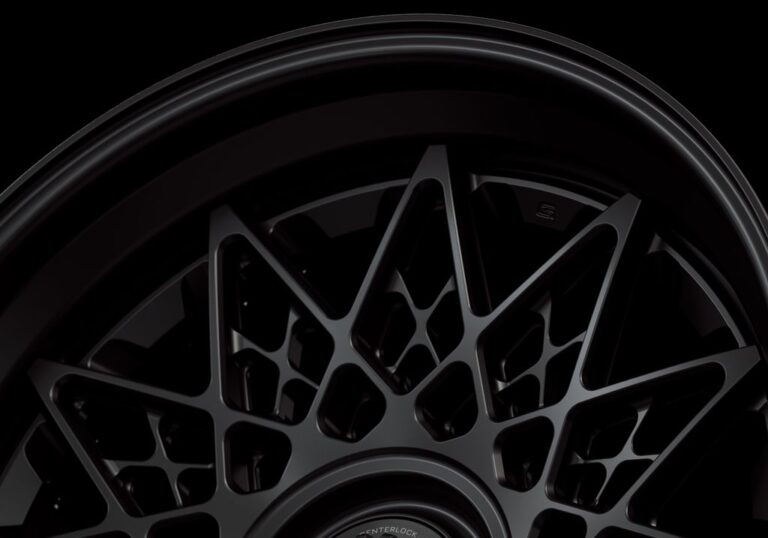Three-quarter view of a black G21 3-piece centerlock wheel from Govad Forged Heritage series