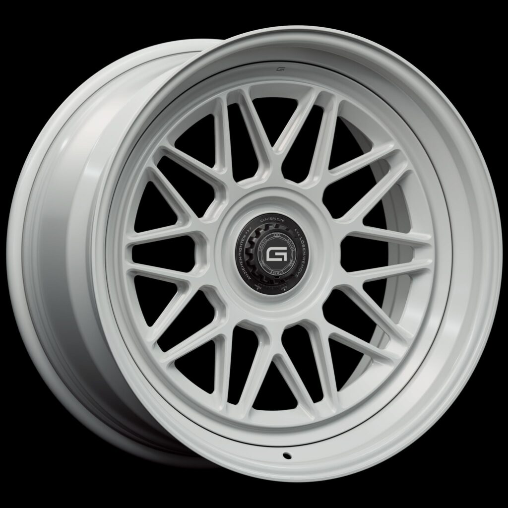 Three-quarter view of a white G24 3-piece centerlock wheel from Govad Forged Heritage series