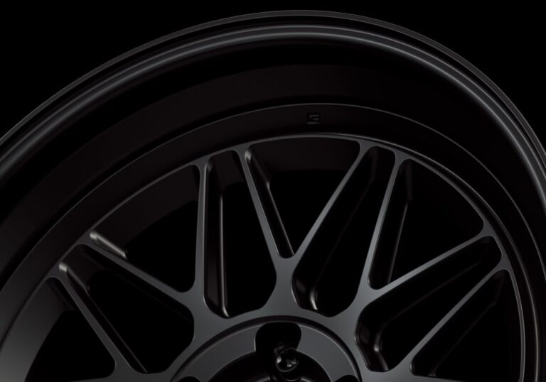 Three-quarter view of a black G24 3-piece wheel from Govad Forged Heritage series