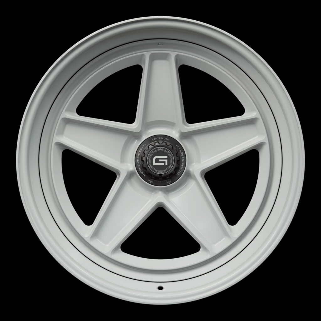 Front view of a white G25 3-piece centerlock wheel from Govad Forged Heritage series