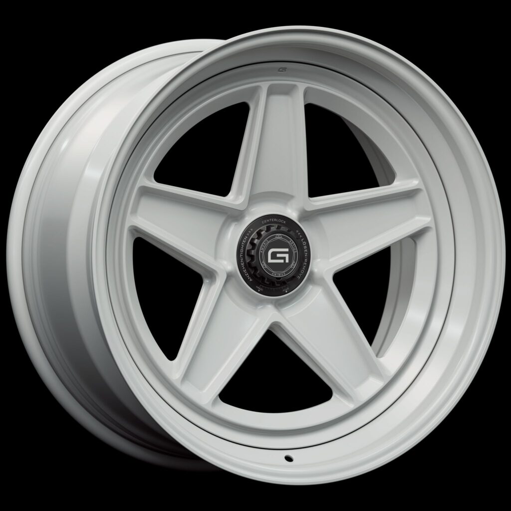 Three-quarter view of a white G25 3-piece centerlock wheel from Govad Forged Heritage series