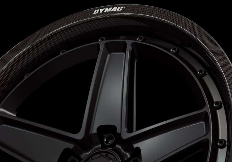 Three-quarter view of a black G25 2-piece wheel from Govad Forged Carbon8 series with carbon fiber lip