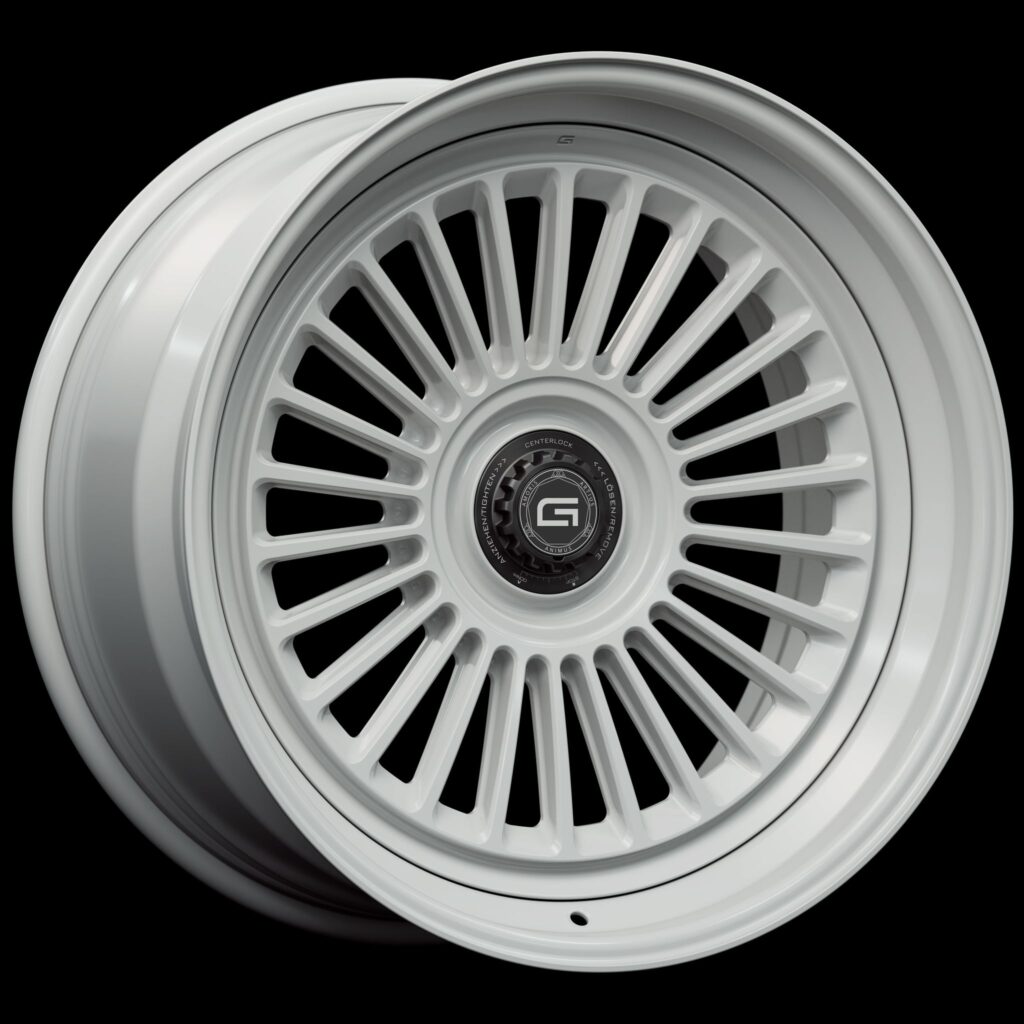 Three-quarter view of a white G26 3-piece centerlock wheel from Govad Forged Heritage series