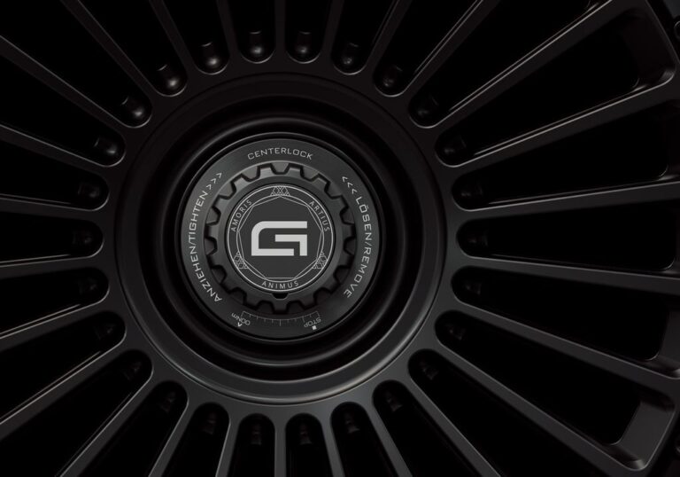 Three-quarter view of a black G26 2-piece centerlock wheel from Govad Forged Carbon8 series with carbon fiber lip