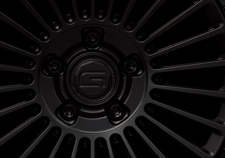Three-quarter view of a black G26 2-piece wheel from Govad Forged Carbon8 series with carbon fiber lip