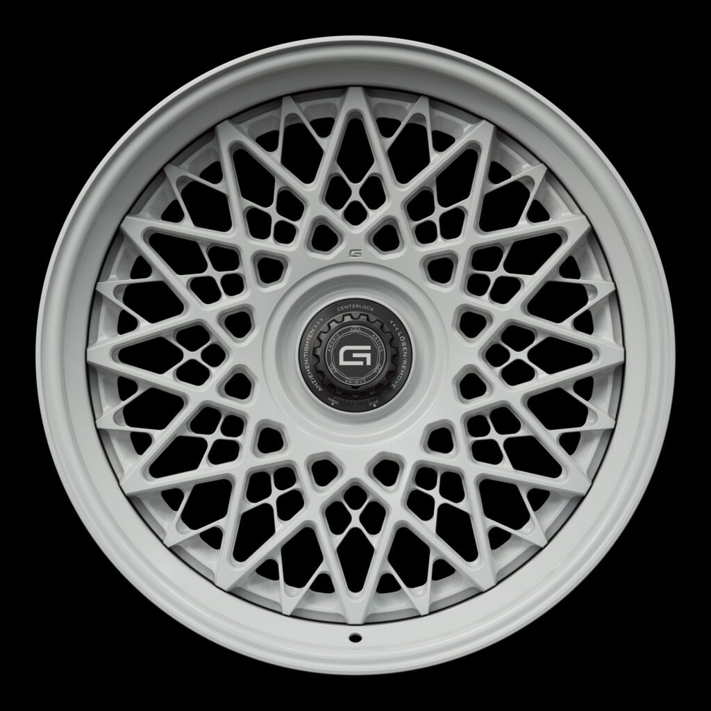 Front view of a white G28 3-piece centerlock wheel from Govad Forged Heritage series