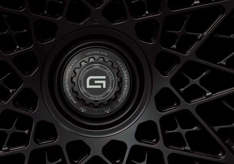 Three-quarter view of a black G28 3-piece centerlock wheel from Govad Forged Heritage series