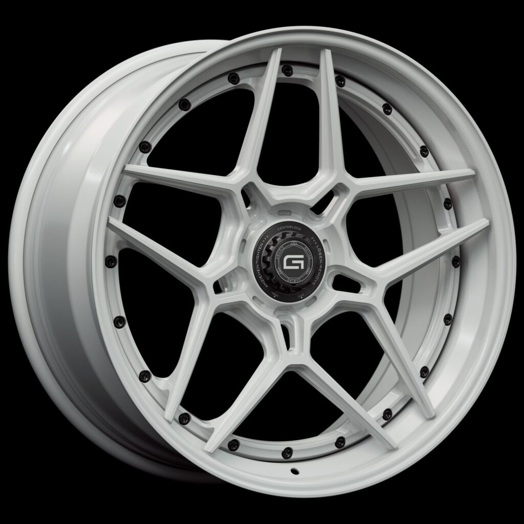Three-quarter view of a white G45 3-piece flaoting spoke centerlock wheel from Govad Forged Track series