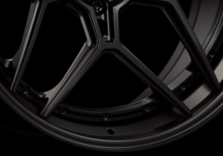 Three-quarter view of a black G45 3-piece flaoting spoke wheel from Govad Forged Track series