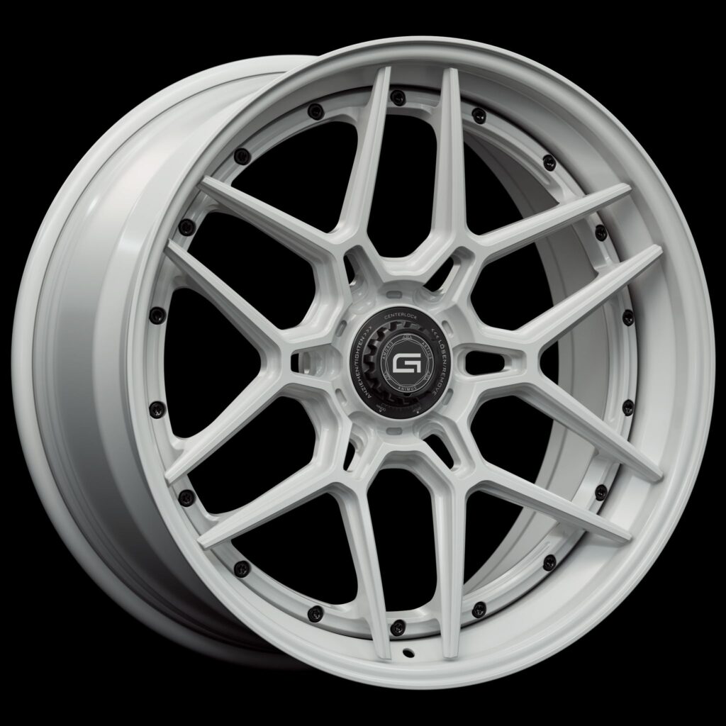 Three-quarter view of a white G46 3-piece flaoting spoke centerlock wheel from Govad Forged Track series