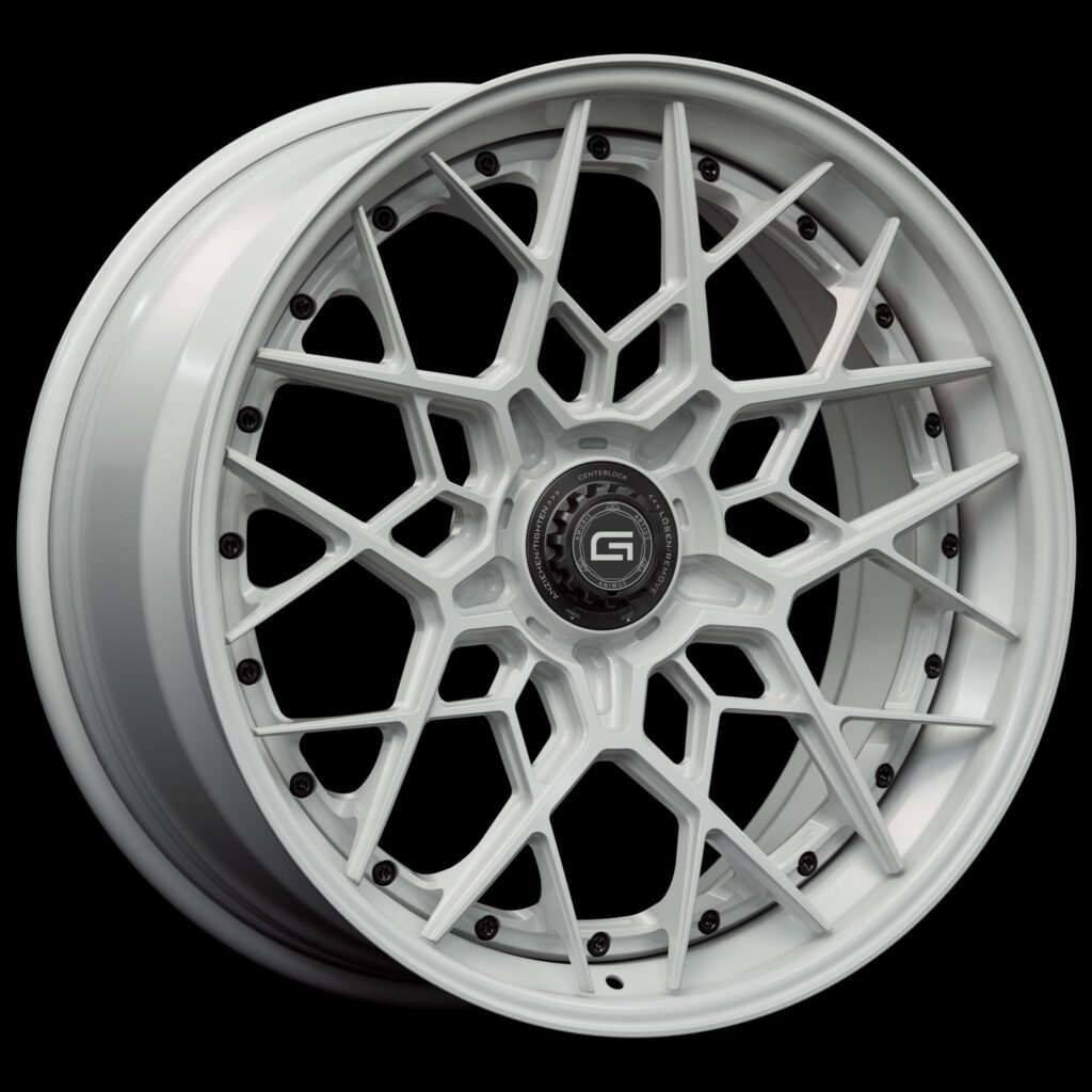 Three-quarter view of a white G47 3-piece flaoting spoke centerlock wheel from Govad Forged Track series