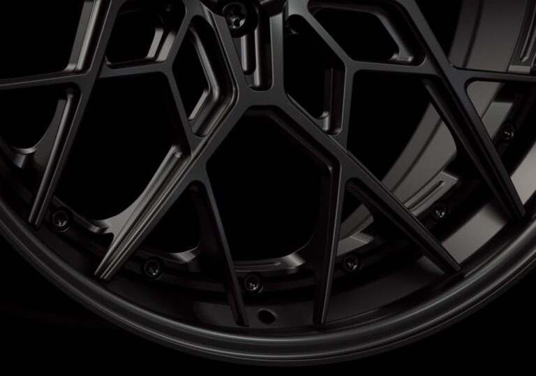 Three-quarter view of a black G47 3-piece flaoting spoke wheel from Govad Forged Track series
