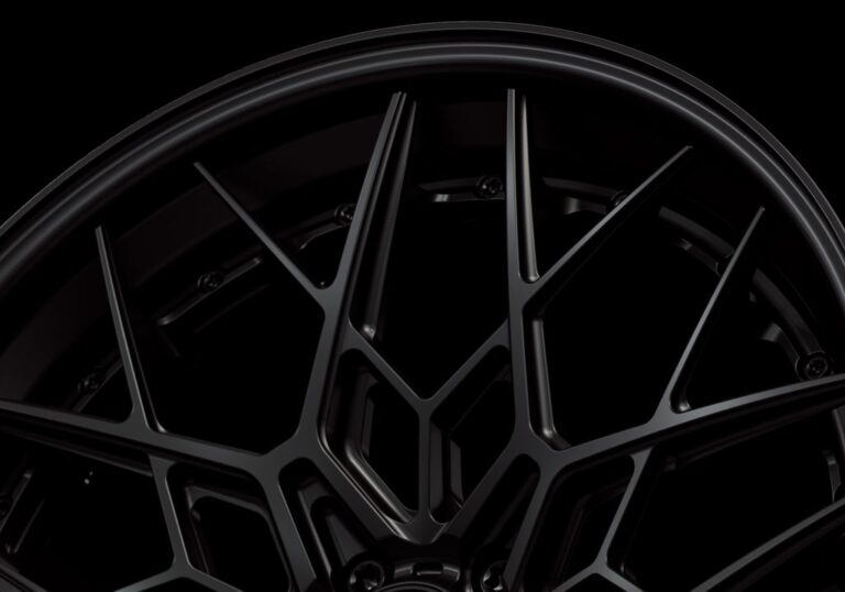 Three-quarter view of a black G47 3-piece flaoting spoke wheel from Govad Forged Track series