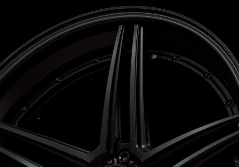 Three-quarter view of a black G51 3-piece flaoting spoke wheel from Govad Forged Track series