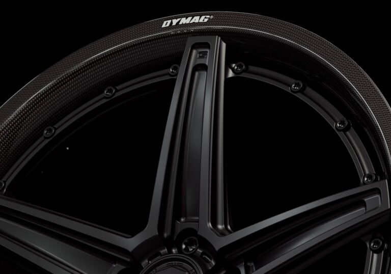 Three-quarter view of a black G52 2-piece wheel from Govad Forged Carbon8 series with carbon fiber lip