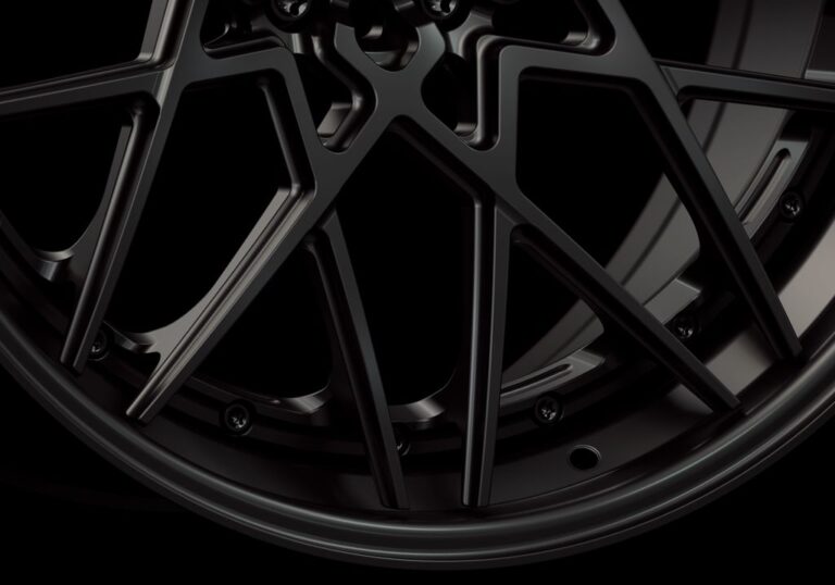 Three-quarter view of a black G53 3-piece flaoting spoke wheel from Govad Forged Track series