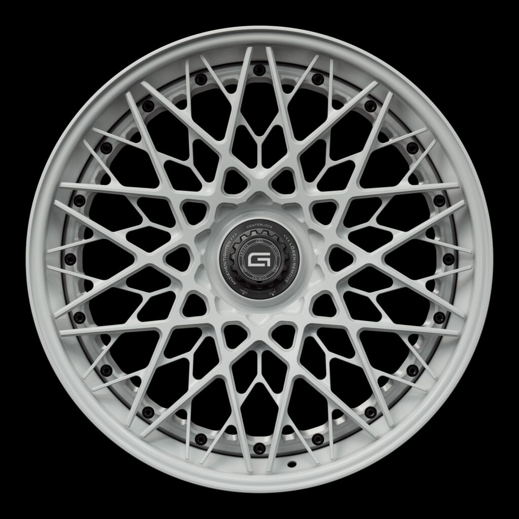 Front view of a white G55 3-piece flaoting spoke centerlock wheel from Govad Forged Track series