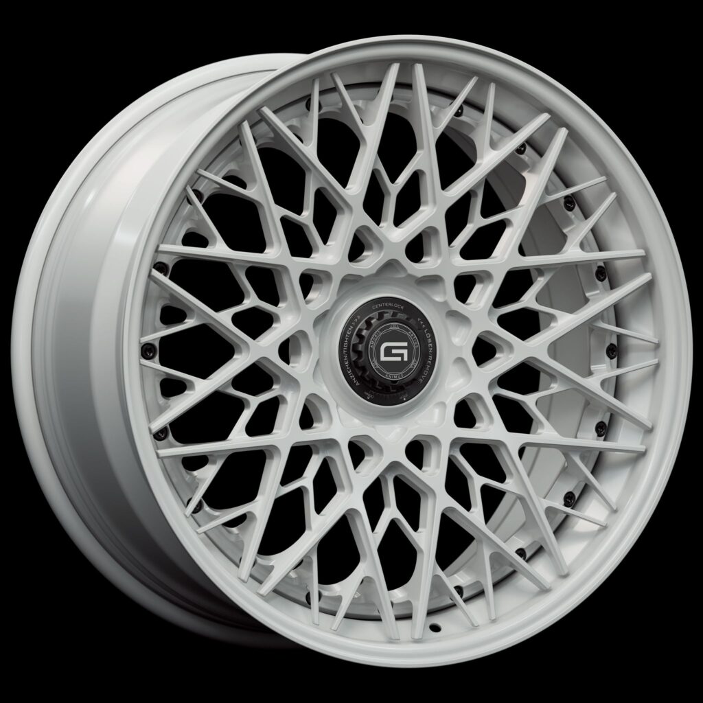 Three-quarter view of a white G55 3-piece flaoting spoke centerlock wheel from Govad Forged Track series
