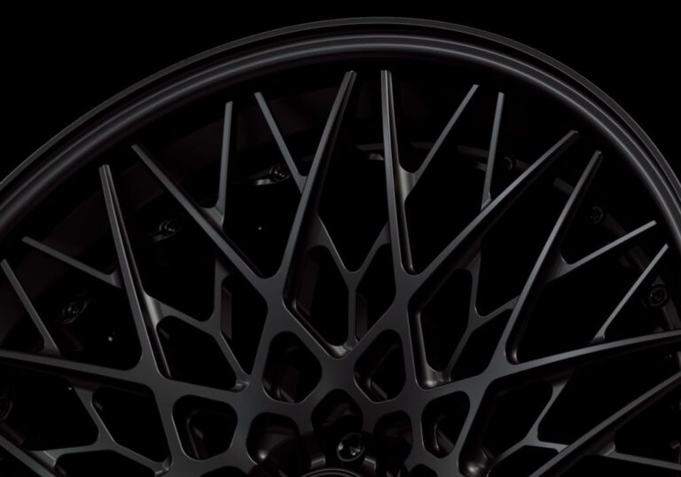 Three-quarter view of a black G55 3-piece flaoting spoke wheel from Govad Forged Track series