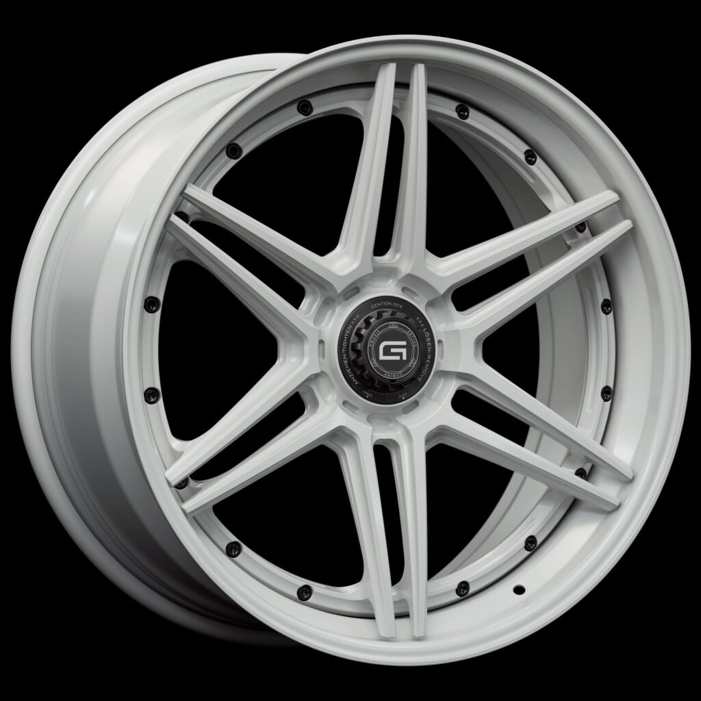 Three-quarter view of a white G56 3-piece flaoting spoke centerlock wheel from Govad Forged Track series