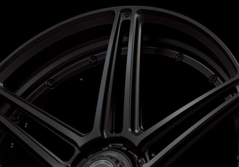 Three-quarter view of a black G56 duoblock centerlock wheel from Govad Forged Track series