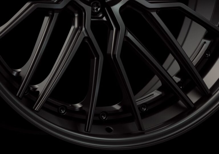 Three-quarter view of a black G57 3-piece flaoting spoke wheel from Govad Forged Track series