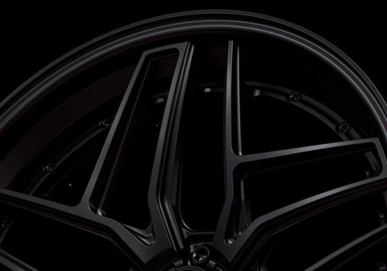 Three-quarter view of a black G58 3-piece flaoting spoke wheel from Govad Forged Track series