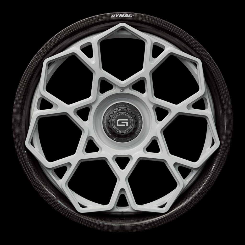 Front view of a white G67 2-piece centerlock wheel from Govad Forged Carbon8 series with carbon fiber lip
