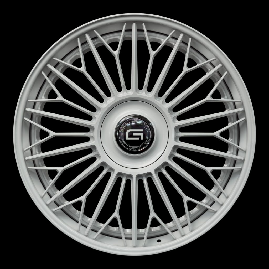 Front view of a white G700 3-piece flaoting spoke wheel from Govad Forged Luxury series