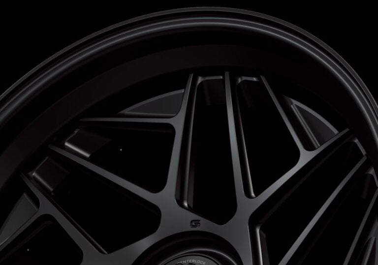 Three-quarter view of a black G74 3-piece centerlock wheel from Govad Forged Evolution series