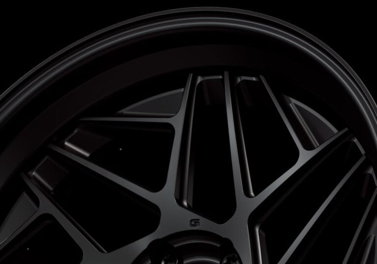 Three-quarter view of a black G74 3-piece wheel from Govad Forged Evolution series